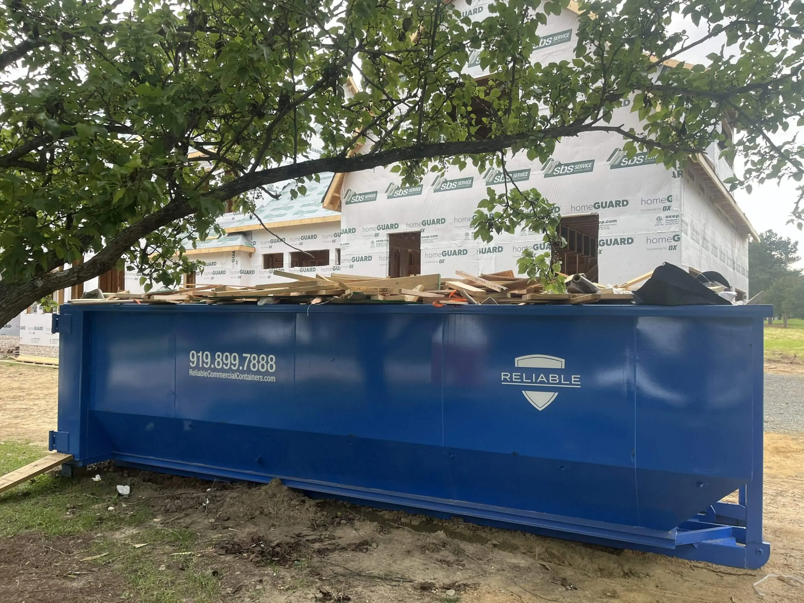 Large Reliable roll-off container on a construction site