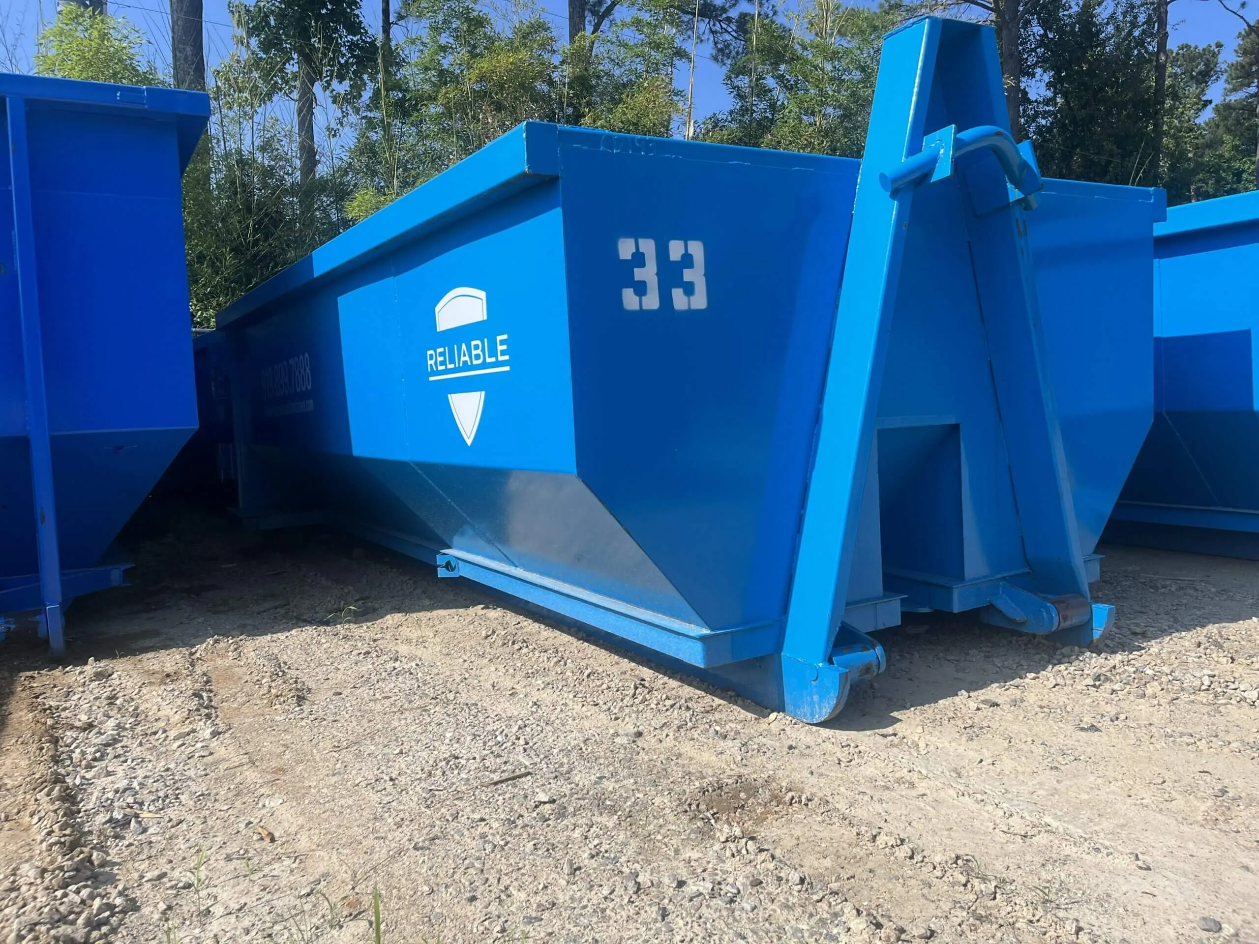 Reliable blue roll-off dumpster ready for delivery